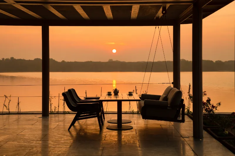 12a baradari outdoor sitting x sunset x lake view  raas chhatrasagar x andre fanthome1741661581.webp